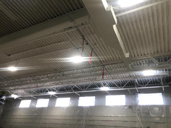 CES - Gym Addition K13 Acoustical Spray In Progress
